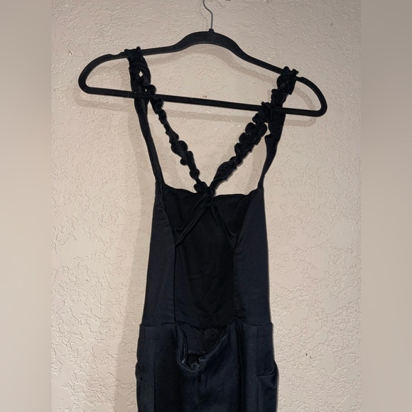 Reformation | Black Ruffle Criss Cross Back Jumpsuit Size: XS - Picture 6 of 6